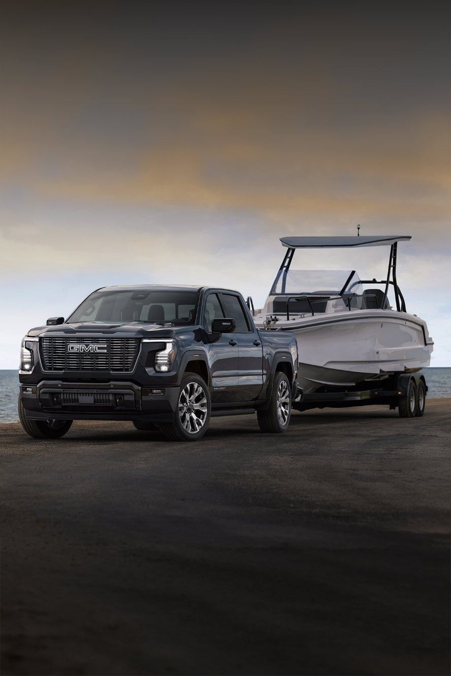 A 2027 GMC Sierra 1500 towing a boat